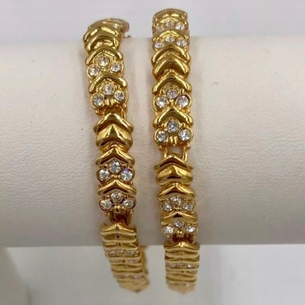 SWAROVSKI CRYSTAL AND GOLD TONE ARROW BRACELET